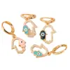 Europa y Estados Unidos moda transfronteriza ojo de diablo palma pendiente de gota de oreja modelado personalidad hermoso hip-hop temperamento aretes de clip para oreja venta al por mayor