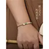 Aún dispuesta a transferir pulsera de cuerda de mano con cuentas usar oro semiacabado nudo de flor de durazno tejida cuatro hilos de cuerda joyería de regalo fina 2 mm