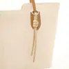 Novo Cordão de Couro PU Moda Versátil Acessórios Pingente de Bolsa DIY Tecido à Mão Pingente Chaveiro de Carro