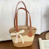 Bolso tipo cubo de moda color block nuevo para el día a día 2026, bolso de playa de paja a rayas, bolso de hombro casual para viajar, bolso tote