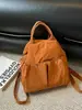 Bolso de hombro ligero Yuezhi 2026 principios de otoño con cordón, bolso tote casual de moda para ir al trabajo y la escuela