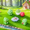Figura de dinosaurio pequeño y lindo de dibujos animados transfronteriza, adorno de paisajismo de jardín DIY, decoración de sala de estar, pequeño adorno para escritorio de oficina
