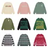 24 Otoño/Invierno Marca de Moda Letra Logo Integral Suéter de Punto Cuello Redondo Unisex Holgado Casual Top Versátil Manga Larga