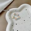Joyería para uñas cielo estrellado blanco parpadeante blanco fondo puntiagudo Súper Flash forma de uña Taladro de cristal corazón torcido amor gordo Taladro cuadrado al por mayor