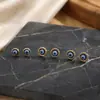 Pendientes Pequeños Circulares en Espiral con Goteo de Aceite de Diablo Estilo Europeo y Americano Transfronterizo con un Diseño de Lujo Ligero, Moda Gótica y Elegantes Accesorios para Orejas