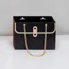 Bolsa de regalo estilo ins para el Día de San Valentín, lujo ligero, flor negra, bolso de mano, saquito rectangular pequeño exquisito al por mayor