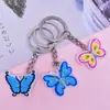 Llavero Colgante Mariposa PVC Pegamento Suave Hebilla Decorativa DIY Colgante Mochila Escolar Amazon Regalo Decorativo Venta al por Mayor en Stock