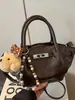 Bolso Cubo de Moda Transfronterizo de Nicho 2026 Nuevo Estilo Coreano Bolso de Hombro con un Toque de Alta Gama Bolso Cruzado Versátil