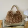 Bolso de mano de felpa transfronterizo para mujer, nueva colección de otoño 2026, bolso tote moderno y versátil, elegante bolso de hombro para el trabajo y bolso cruzado