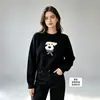 Suéter tejido suave y amigable con la piel europeo y americano con cachorro de peluche tridimensional y lazo a cuadros, jersey holgado y favorecedor para mujer
