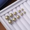 Aretes Colgantes Forma Pan al Vapor Plano Perla Gris Aguja de Plata para Mujer Japoneses y Coreanos Color Sólido Simples Aretes de Estilo Cool de Alta Gama