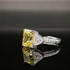 Anillo de Diamante de Alto Carbono S925 Europeo y Americano Explosiones en Vivo Femeninas Cara de Corte Flor de Hielo Seiko Anillo de Diamante Incrustado Completamente Uso Diario