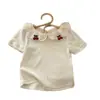 Camiseta de Manga Corta con Cuello Solapa y Bordado de Cerezas Estilo Dulce para Niñas, Top Versátil de Moda Coreana Nuevo Verano 2026