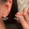 Nuevos Pendientes de Saturno Huecos con Circonitas Cortadas Chapados en Oro Elegantes y Simples Estilo Ins con Cierre de Plata Pendientes de Planeta Elegantes para Mujer