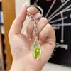 Chaveiro de Pingente de Concha Luminosa Simulada Acrílica Transparente Transfronteiriço para Casal Chaveiro Feminino Joias Atacado