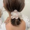 Versión coreana de Dongdaemun 2023 nueva flor de organza de color mágico Anillo para el pelo de perla Accesorios para el pelo de estilo extranjero Joyería de cabeza de bola