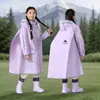 Impermeable infantil para niños y niñas con espacio para mochila, impermeable de cuerpo entero, a prueba de lluvia, con capucha, poncho de lluvia ligero para uso escolar