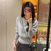 Suéter de punto atmosférico de cuello en V y manga larga para mujer, top interior adelgazante de otoño que ciñe la cintura
