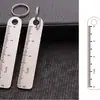 Placa grabada con número de teléfono anti-pérdida Llavero para coche Colgante para hombre y mujer Latón Acero Inoxidable Llavero con etiqueta para teléfono móvil