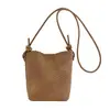 2026 Nova Moda Bolsa para Celular Cor Sólida Textura Retro Bolsa de Ombro Única para o Trabalho Nicho Bolsa de Ombro Cruzada Feminina