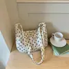 Bolsa de Ombro Único com Bolinhas Estilo Coreano Feminina 2026 Nova Grande Capacidade para o Trabalho Casual Bolsa Transversal Estudante Versátil Bolsa de Ombro