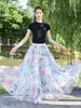 26 Nova Saia Estampada Estilo Boho Resort Europeu e Americano Primavera/Verão com Barra Larga para Mulheres