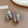 Pendientes de botón con patrón geométrico nuevo transfronterizos europeos y americanos, pendientes de estilo metálico, diseño de nicho, pendientes de tendencia de moda individual, accesorios para pendientes