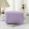 Bolsa de cosméticos de seersucker de venta caliente transfronteriza, de mano, gran capacidad, bolsa de aseo, rayas bordadas, bolsa de almacenamiento de cosméticos de viaje