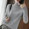 Suéter de punto para mujer 2026 grueso otoño e invierno manga larga capa base tejido suelto transfronterizo cuello alto nuevo color liso estilo coreano ropa de mujer
