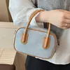 Bolsa de Mão Nicho Transfronteiriça para Axila Feminina 2025 Nova Cor Retro Color-Blocking Bolsa Transversal Versátil Bolsa Bowling Tendência