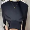 Camiseta interior básica de manga larga y cuello medio para mujer, nueva colección de principios de otoño 2026, corte ajustado, adelgazante, blanca, simple, versátil