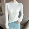 Nuevo suéter de punto liso cómodo, versátil, simple y elegante para otoño e invierno con bordes de volantes y cuello semi-alto