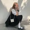 Conjunto de Dos Piezas para Mujer Verano 2026 Nuevo Estilo Coreano Retro Francés con Mangas Abullonadas Manga Corta + Chaleco Adelgazante Falda de Corte A
