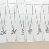 Novo Colar com Letra Corrente de Bolinhas Douradas Colar com Pingente de Letra Inglesa Corrente para Clavícula de Menina Estudante Loja de 2 Yuan