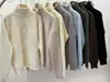 Tricô Branco com Gola Lapela e Meio Zíper para Mulheres no Outono e Inverno Novo Pulôver Solto com Fenda Parte de Baixo Tricô Top
