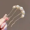 Novo grampo de cabelo pérola com apliques de diamante estilo coreano, versátil para penteados de coque na parte de trás da cabeça, acessório de cabelo moderno de luxo leve para mulheres, atacado