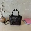 Bolso de Cubo Minimalista de Nicho Portátil 2026 Verano Nuevo Estilo Coreano de Moda Bolso de Hombro Cruzado con Patrón Tejido
