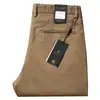 Estación europea hombres otoño e invierno grueso interior cepillado sarga hombres pantalones no planchar cómodos algodón rectos holgados casuales pantalones