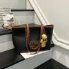 Bolso grande de mujer retro transfronterizo 2026 nueva moda versión coreana bolso tote de nicho para viajes bolso simple de axila