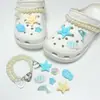 Encantos lindos de dibujos animados para zapatos con varios agujeros, decoraciones versátiles de resina para zapatos, mariposa, burbuja, flor, animales, charms decorativos al por mayor