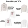 T1325 Calle Principal Estilo Americano Unisex Retro Tendencia Callejera Diseño de Estampado de Personaje Versión Ajustada Camiseta de Manga Larga para Hombre