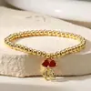 Nuevo Producto Transfronterizo Aogu: Pulsera Minimalista y Única de Cobre con Baño de Oro de 18 Quilates, Incrustación de Circonia y Dijes de Corazón, Ojo y Libélula