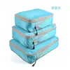 Bolsa de almacenamiento de viaje explosiva de Amazon, bolsa de tres piezas para organizar ropa, bolsa de almacenamiento impermeable compresible, fabricantes, lote