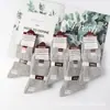 Envío gratis calcetines de invierno de cintura alta desodorantes anti-pilling doble aguja antibacterianos para hombre y mujer mercado mayorista comparable