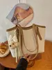 Bolsa de mano transfronteriza de moda 2026 verano nueva bolsa de mano de gran capacidad para mujer, elegante bolso de hombro para la ciudad, bolso de axila
