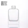 Botella de aromaterapia de vidrio cuadrado plano de hombro redondo sin fuego botella de vidrio de ratán botella volátil de fragancia de aceite esencial botella de aromaterapia para interiores venta al por mayor