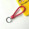 Llavero creativo de cuerda de cuero tejido a mano para pareja, llavero de coche, llavero al por mayor, colgante para bolso