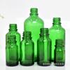 Suministro directo botella de aceite verde de 10 ml botella con gotero de 15 ml subenvasado de solución madre cosmética botella de vidrio oscuro