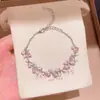 Pulseira com pingente oval de zircônia rosa fresca, com design único, personalidade de nicho, luxo leve e sensação de alta qualidade