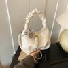 2025 Nuevo Distintivo Simple Moda Nicho Plegado Portátil Bolso de Axila Casual Viaje Cadena Bolso Cruzado para Mujeres